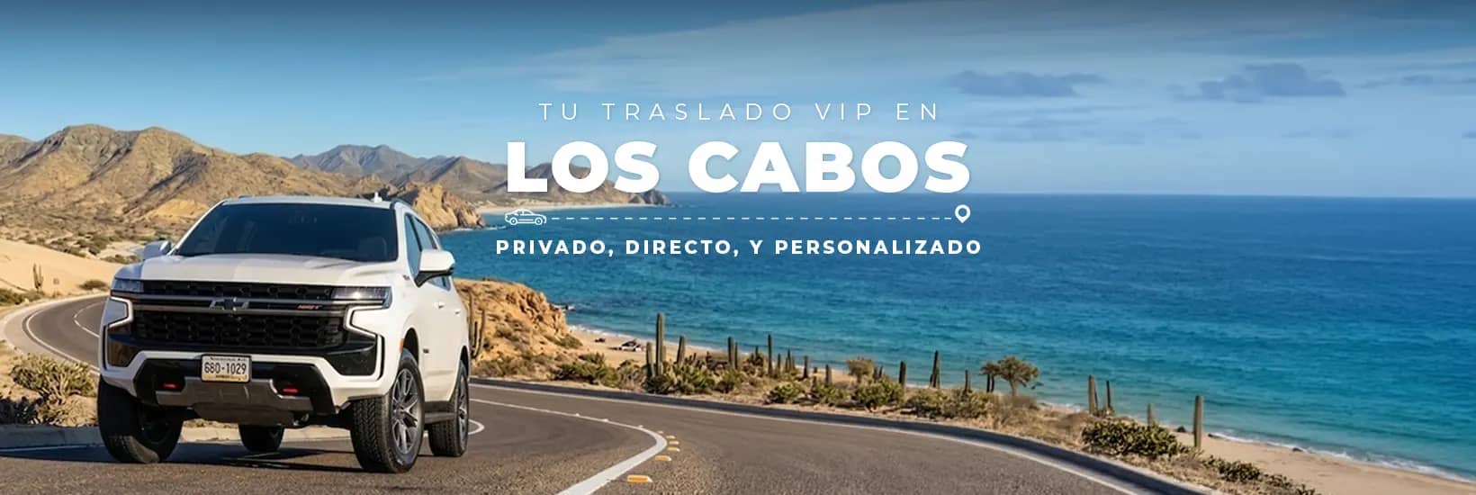 Flota de camionetas Suburban de TransVIP en un paisaje desértico de Los Cabos